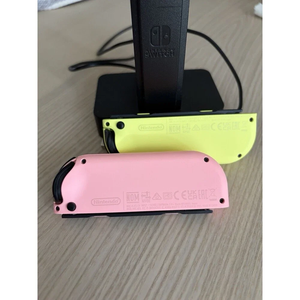 Nintendo Switch Joy-Con Controllers Neon Pink Yellow Charging Dock Wrist Straps